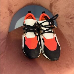 Pink and Black Sneakers with Gold Accents